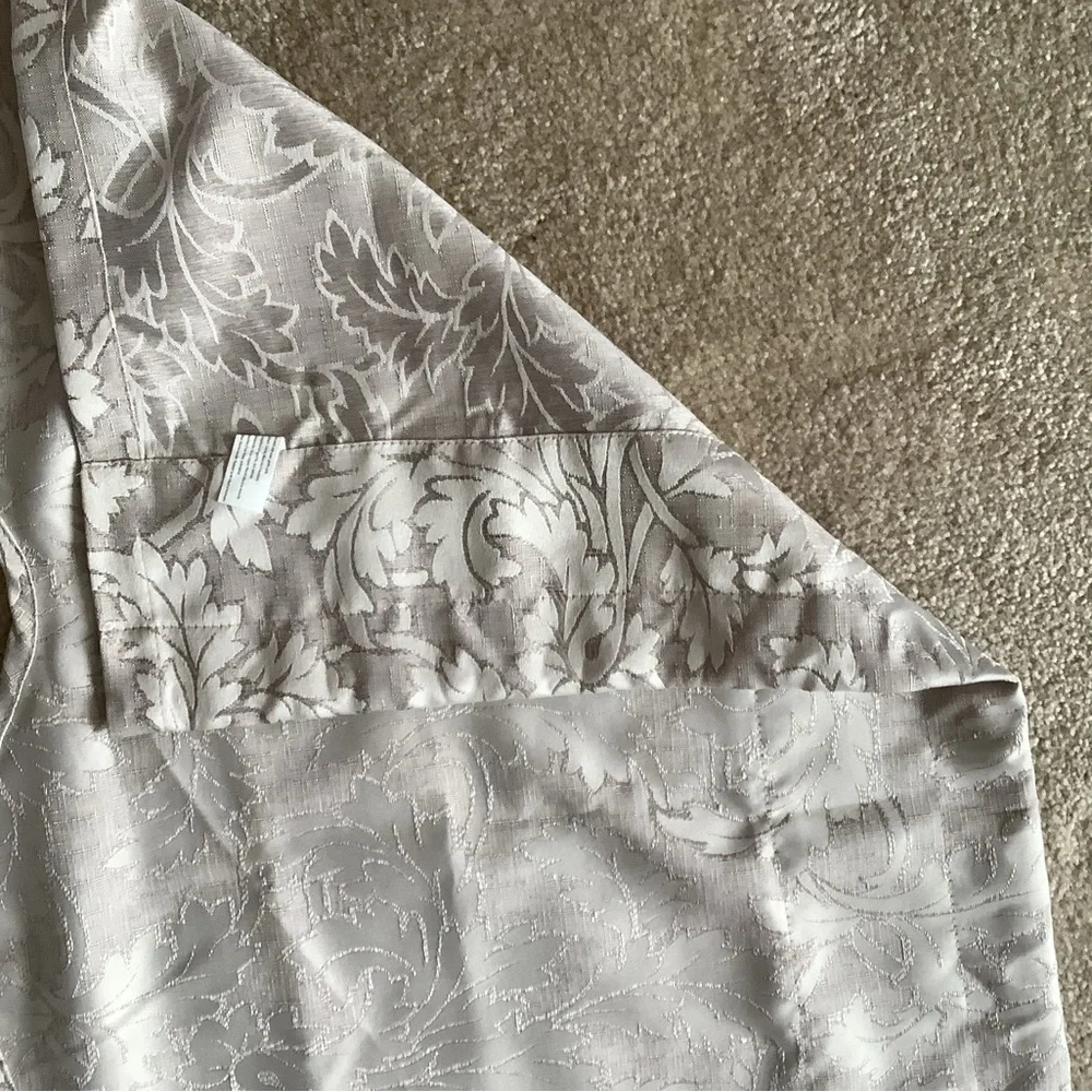 Valance set of (2) beige with pretty designs only used 6 months like new…